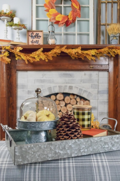 A cozy cottage interior with a fireplace, wooden furniture, and shelves filled with jars of homemade preserves. Sunlight streams through the window, illuminating dust motes in the air.