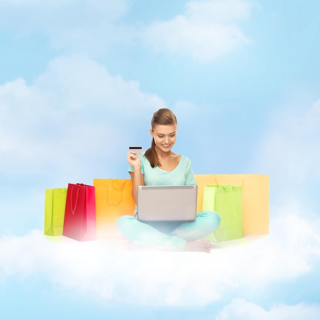 A person excitedly shopping online on their laptop, surrounded by digital flying shopping carts and percentage discount icons. The screen displays a flash sale countdown timer and product images with crossed-out regular prices and highlighted sale prices.