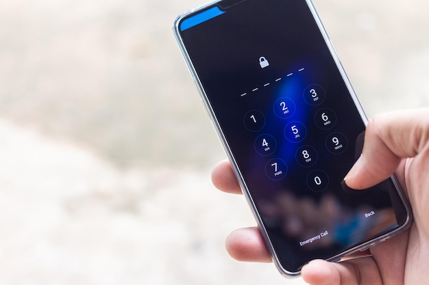 A close-up of a smartphone screen displaying a VPN app interface with encryption keys and firewall settings highlighted, indicating strong security features. The background shows a blurred coffee shop scene, representing public Wi-Fi usage.