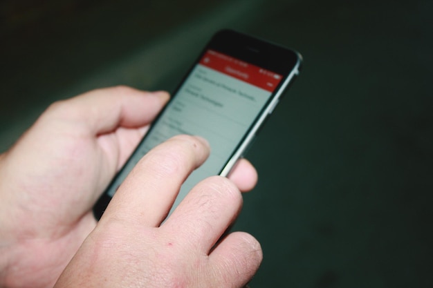 A close-up shot of a smartphone displaying an error message during online checkout. The message reads, 